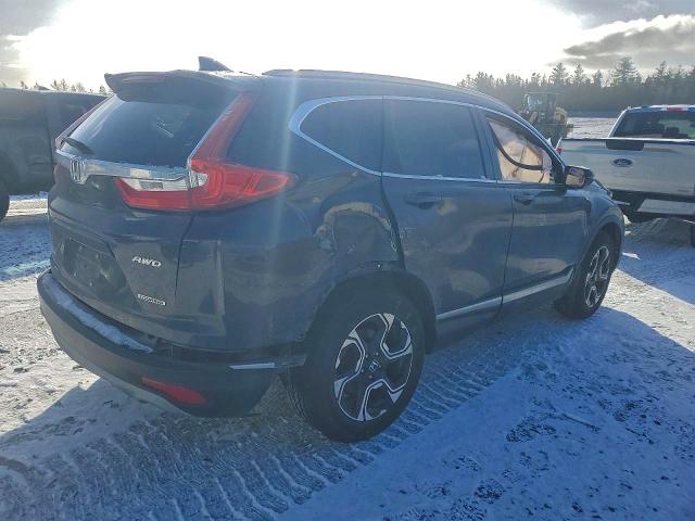 Photo 3 from auction – 2018 HONDA CR-V with VIN 2HKRW2H93JH110534