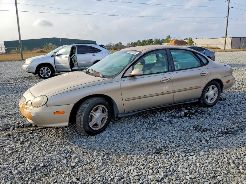 FORD TAURUS 1999 with VIN 1FAFP53U4XA291081 - Photo from auction