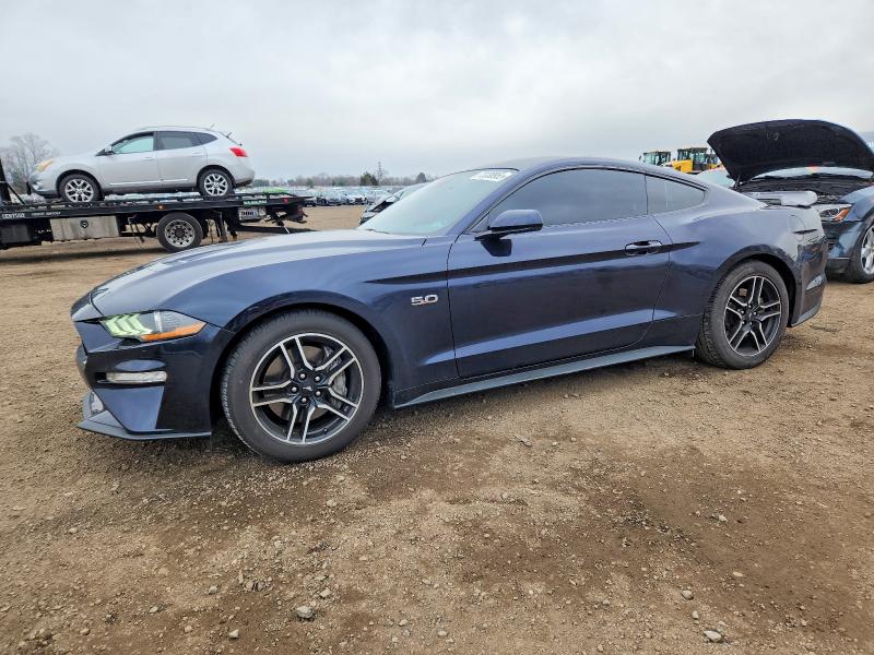 FORD MUSTANG 2021 with VIN 1FA6P8CF8M5102052 - Photo from auction