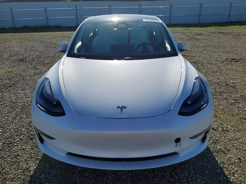 Photo 5 from auction – 2021 TESLA MODEL 3 with VIN 5YJ3E1EA3MF928852