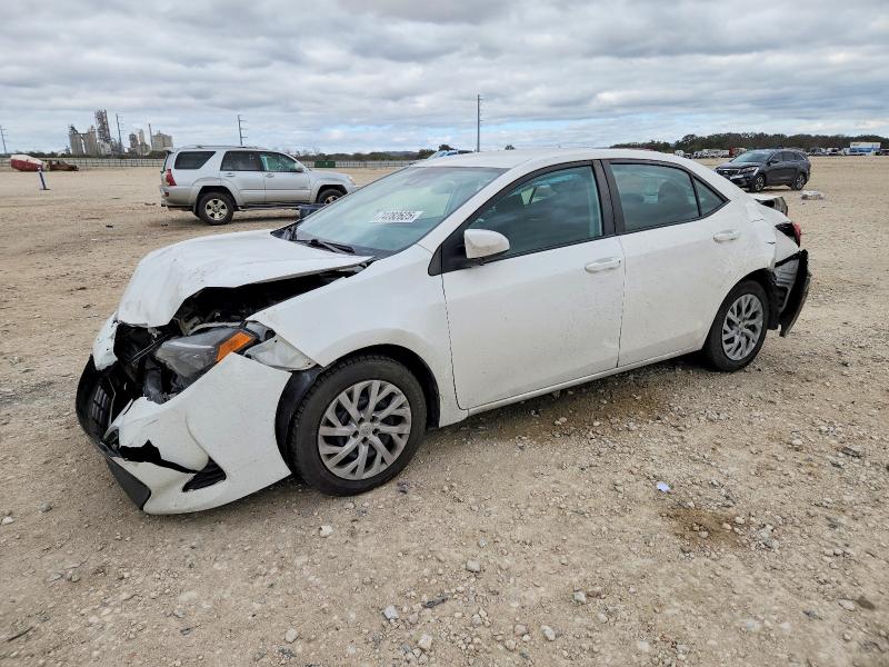 TOYOTA COROLLA L 2019 with VIN 5YFBURHE7KP928267 - Photo from auction