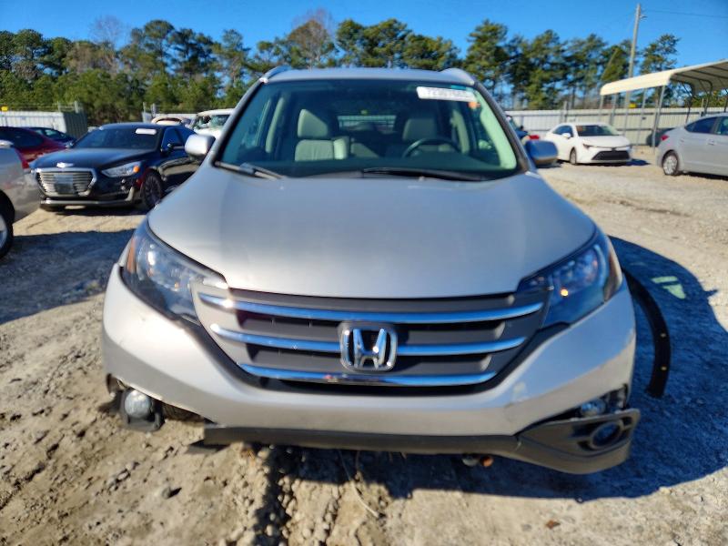 Photo 5 from auction – 2012 HONDA CR-V with VIN 2HKRM3H75CH502640
