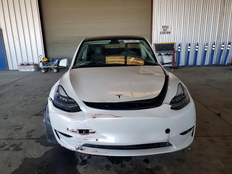 Photo 5 from auction – 2021 TESLA MODEL Y with VIN 5YJYGDEE9MF231934