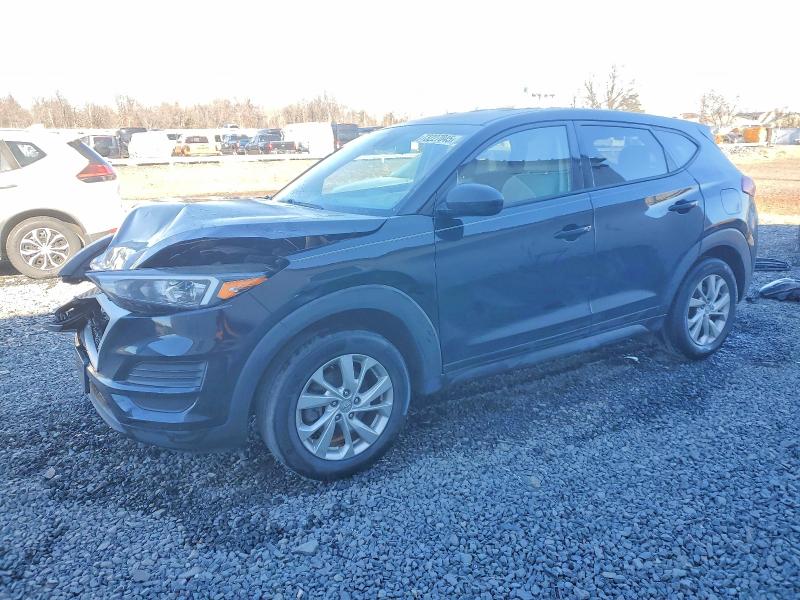 HYUNDAI TUCSON SE 2019 with VIN KM8J2CA42KU073170 - Photo from auction