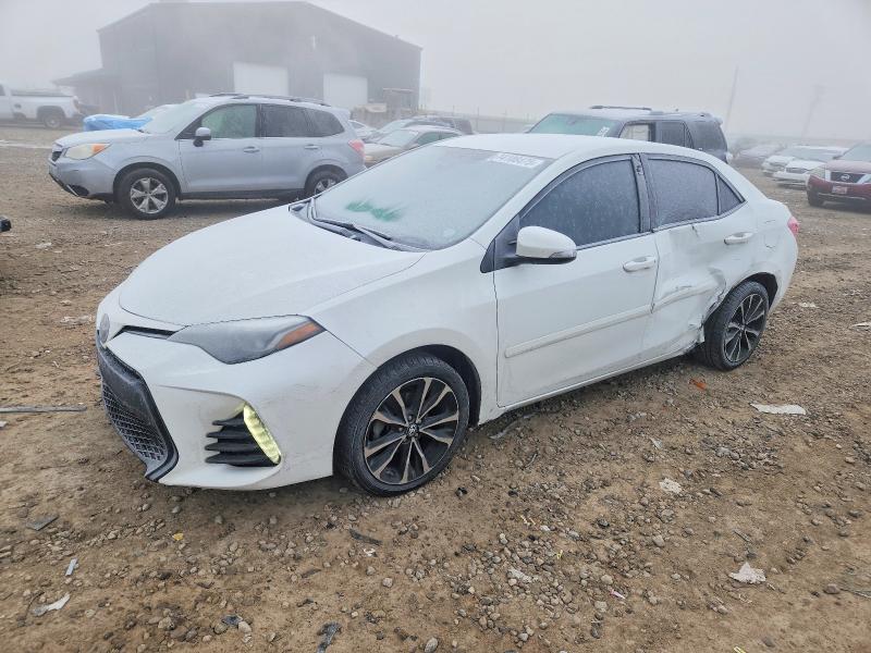 TOYOTA COROLLA L 2017 with VIN 5YFBURHE1HP618155 - Photo from auction
