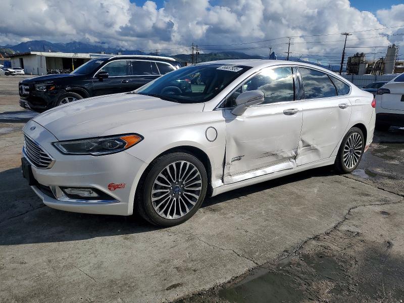 FORD FUSION TIT 2017 with VIN 3FA6P0SU4HR275863 - Photo from auction