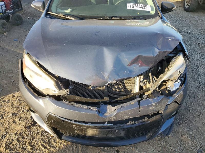Photo 11 from auction – 2014 TOYOTA COROLLA L with VIN 5YFBURHEXEP039516