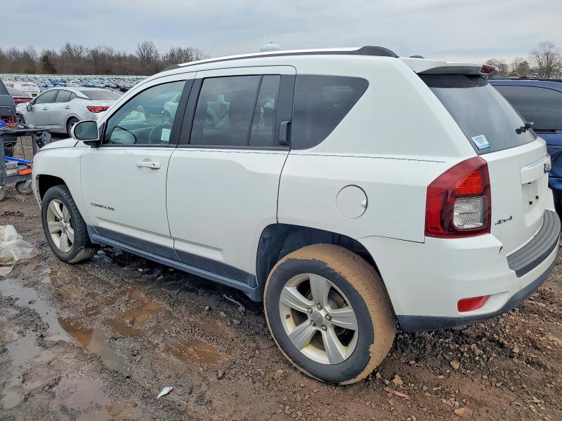 Photo 2 from auction – 2014 JEEP COMPASS with VIN 1C4NJDEB6ED826985