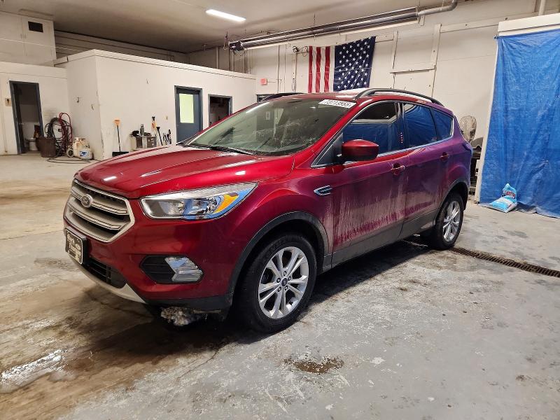 FORD ESCAPE 2018 with VIN 1FMCU0GD8JUC45970 - Photo from auction