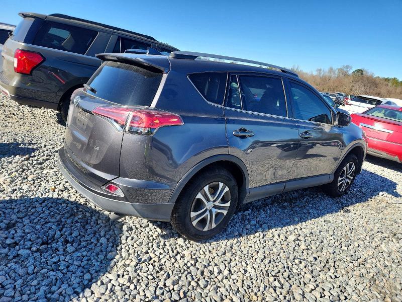 Photo 3 from auction – 2018 TOYOTA RAV4 LE with VIN 2T3ZFREV9JW457210