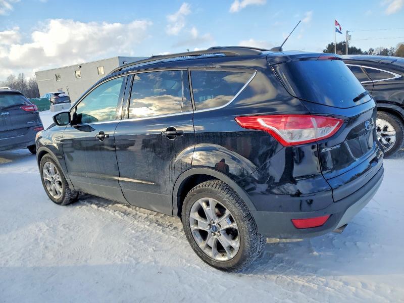 Photo 2 from auction – 2016 FORD ESCAPE SE with VIN 1FMCU9GX3GUA86928