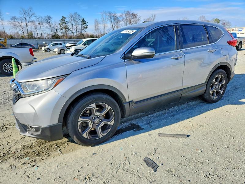 HONDA CR-V 2018 with VIN 7FARW1H85JE037879 - Photo from auction