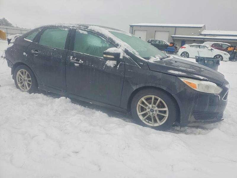 Photo 4 from auction – 2016 FORD FOCUS SE with VIN 1FADP3F29GL248107