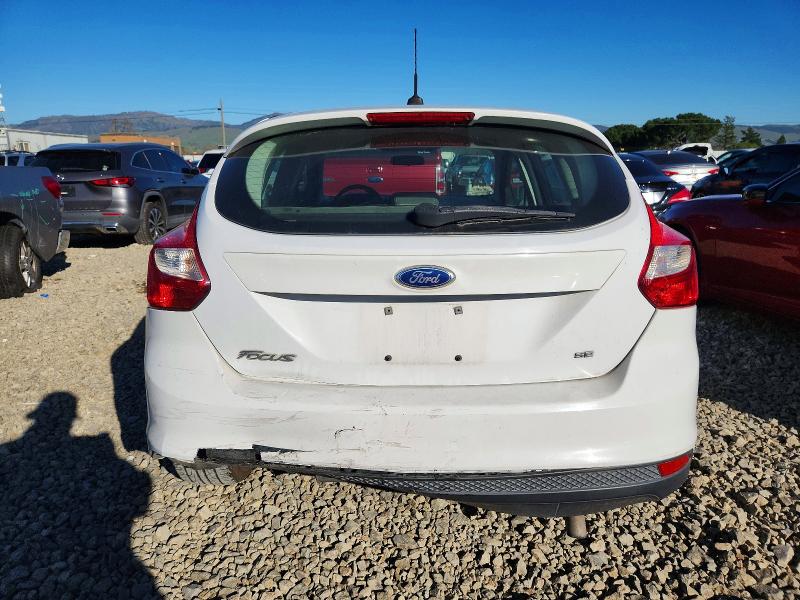 Foto 6 de la subasta – 2013 FORD FOCUS SE con VIN 1FADP3K23DL237668