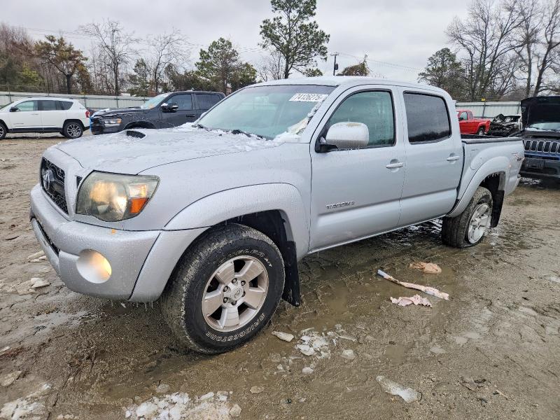 TOYOTA TACOMA DOU 2011 with VIN 3TMLU4EN2BM059533 - Photo from auction