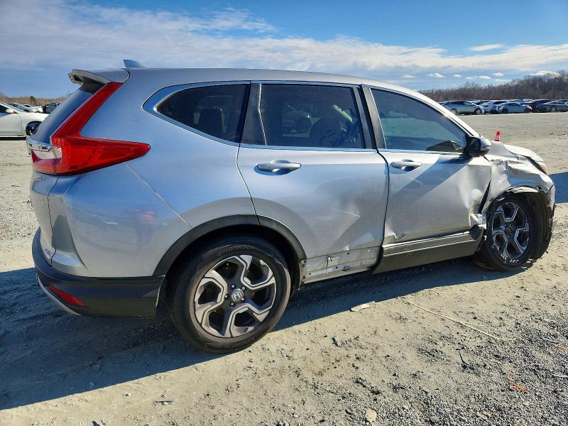 Photo 3 from auction – 2018 HONDA CR-V with VIN 7FARW1H85JE037879