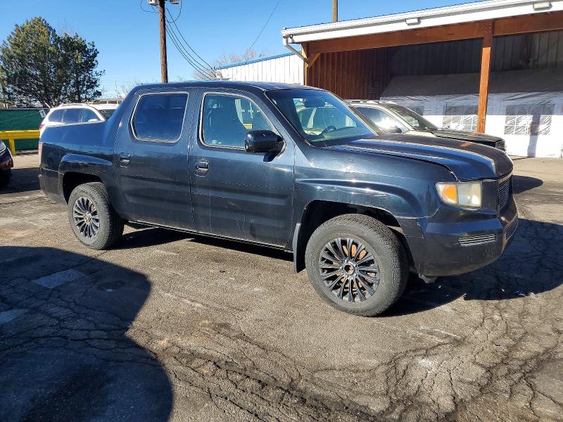 Photo 4 from auction – 2006 HONDA RIDGELINE with VIN 2HJYK16536H512440