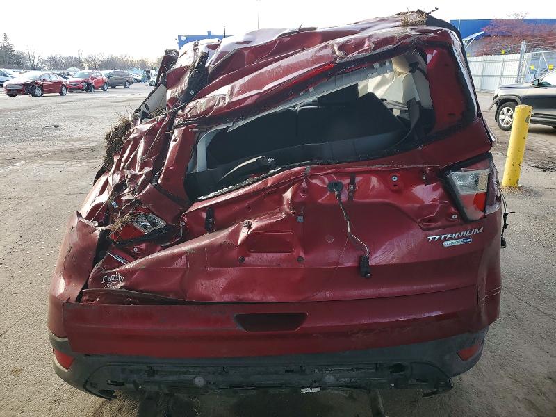 Photo 6 from auction – 2017 FORD ESCAPE TIT with VIN 1FMCU9J98HUB51090