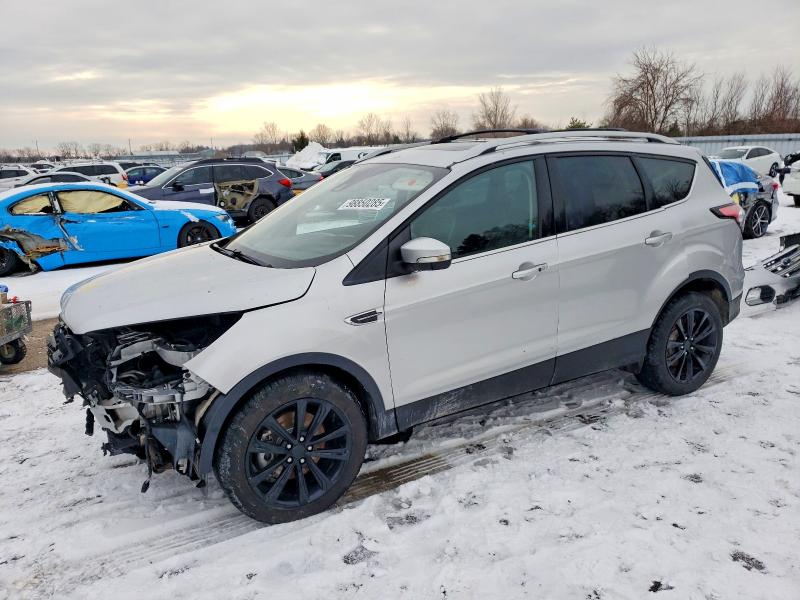 FORD ESCAPE 2017 with VIN 1FMCU0J98HUB69343 - Photo from auction