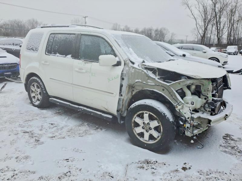 Photo 4 from auction – 2011 HONDA PILOT TOUR with VIN 5FNYF4H96BB038011