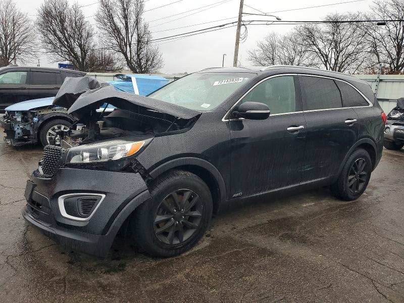 KIA SORENTO LX 2016 with VIN 5XYPGDA37GG003833 - Photo from auction