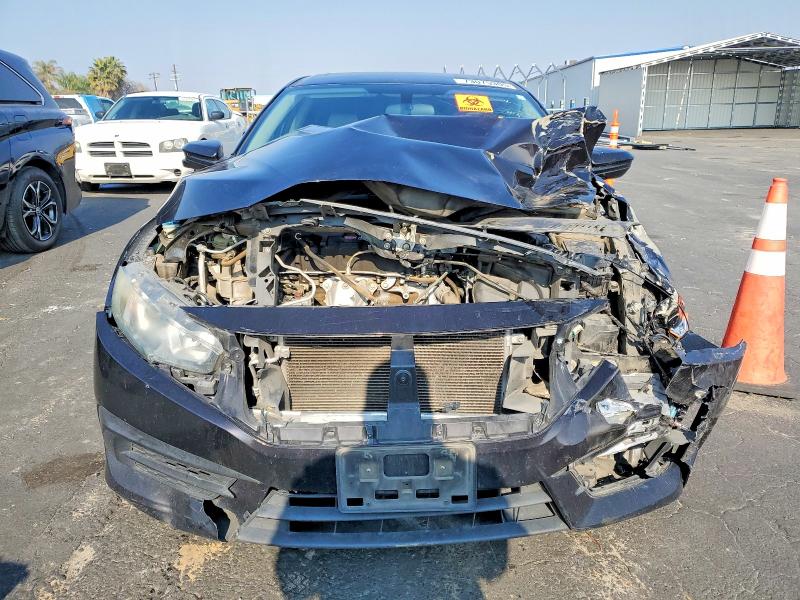 Photo 5 from auction – 2016 HONDA CIVIC with VIN 2HGFC2F77GH511682