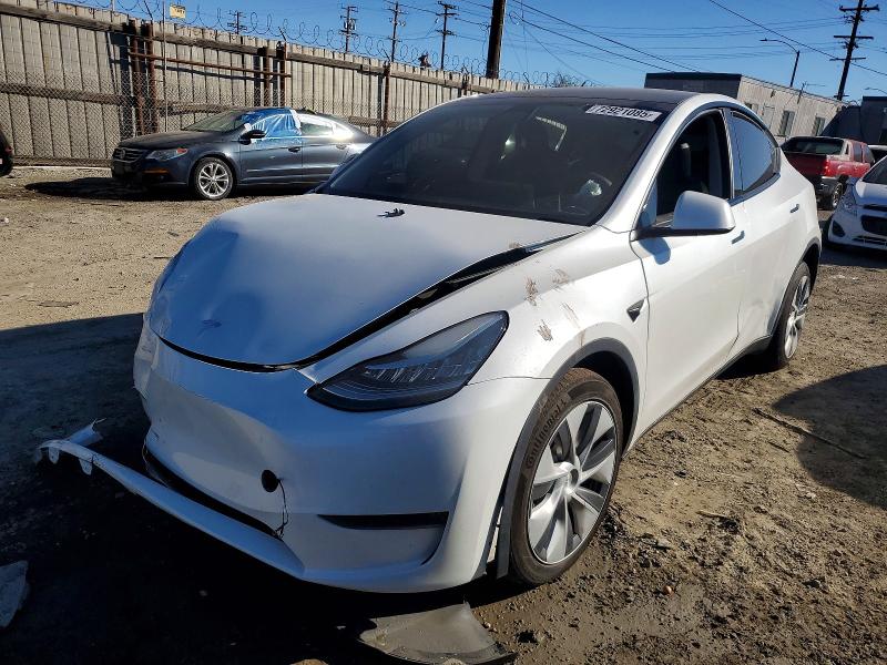 TESLA MODEL Y 2023 with VIN 7SAYGDEE0PA069812 - Photo from auction
