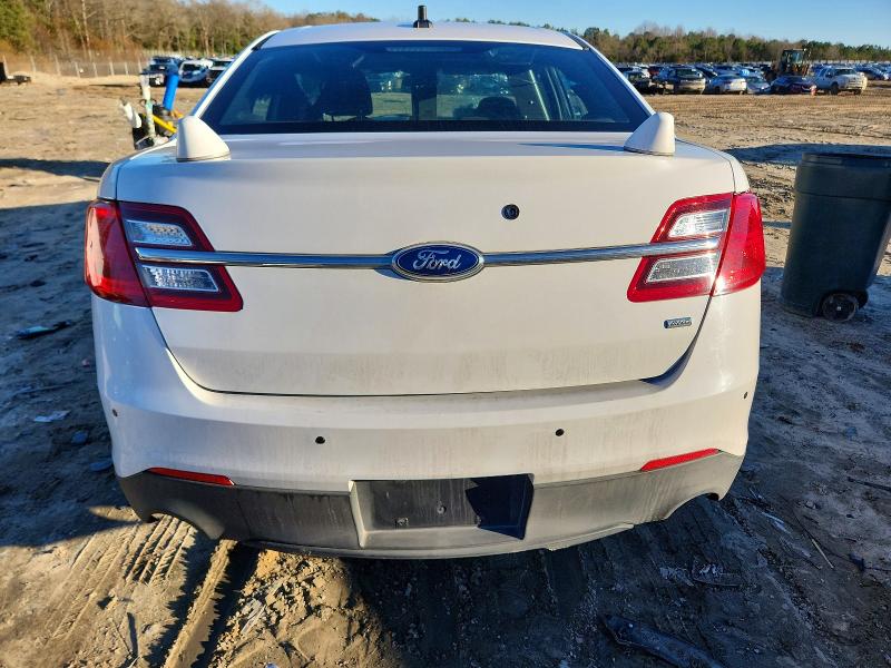 Photo 6 from auction – 2014 FORD TAURUS POL with VIN 1FAHP2MK1EG119945