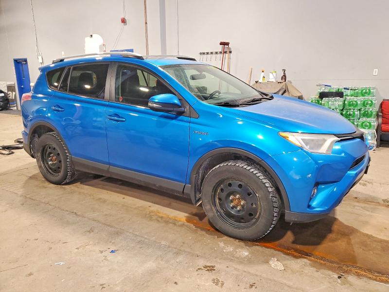 Photo 4 from auction – 2016 TOYOTA RAV4 HV XL with VIN JTMRJREV7GD004563