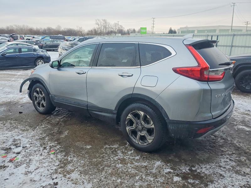 Photo 2 from auction – 2018 HONDA CR-V EX with VIN 7FARW2H53JE001121