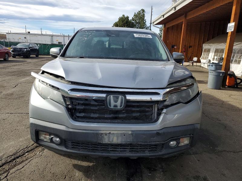 Photo 5 from auction – 2020 HONDA RIDGELINE with VIN 5FPYK3F52LB012939