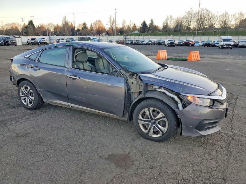 Photo 4 from auction – 2018 HONDA CIVIC LX with VIN 2HGFC2F56JH596004