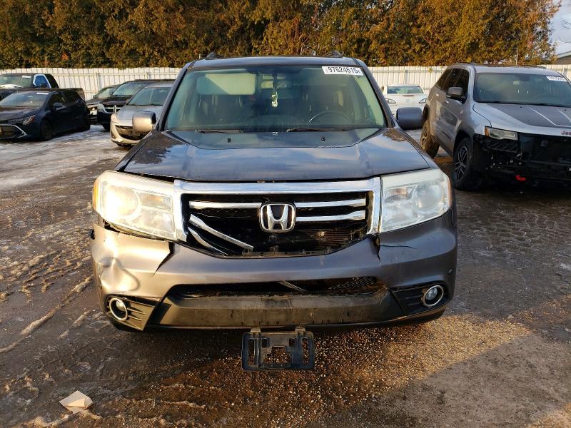 Photo 5 from auction – 2014 HONDA PILOT TOUR with VIN 5FNYF4H96EB501415