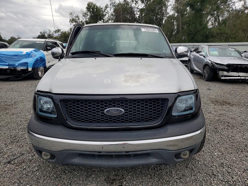 Photo 5 from auction – 2001 FORD F150 with VIN 1FTRX17W31NA02753
