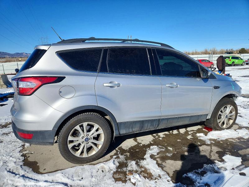 Photo 3 from auction – 2018 FORD ESCAPE with VIN 1FMCU9HD0JUC35033