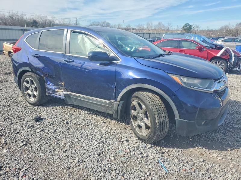 Photo 4 from auction – 2017 HONDA CR-V with VIN 7FARW1H84HE044607