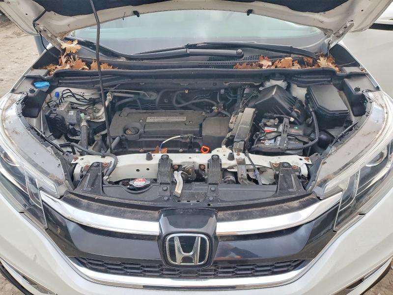 Photo 12 from auction – 2015 HONDA CR-V TOURI with VIN 5J6RM4H93FL040340
