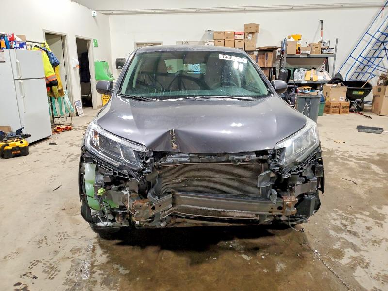 Photo 5 from auction – 2016 HONDA CR-V SE with VIN 2HKRM4H4XGH128995