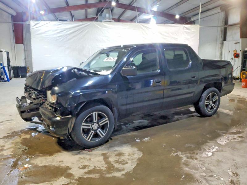 HONDA RIDGELINE 2014 with VIN 5FPYK1F72EB011444 - Photo from auction