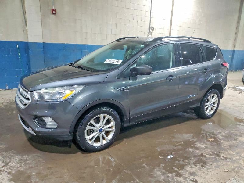 FORD ESCAPE SE 2018 with VIN 1FMCU9GD6JUC57815 - Photo from auction