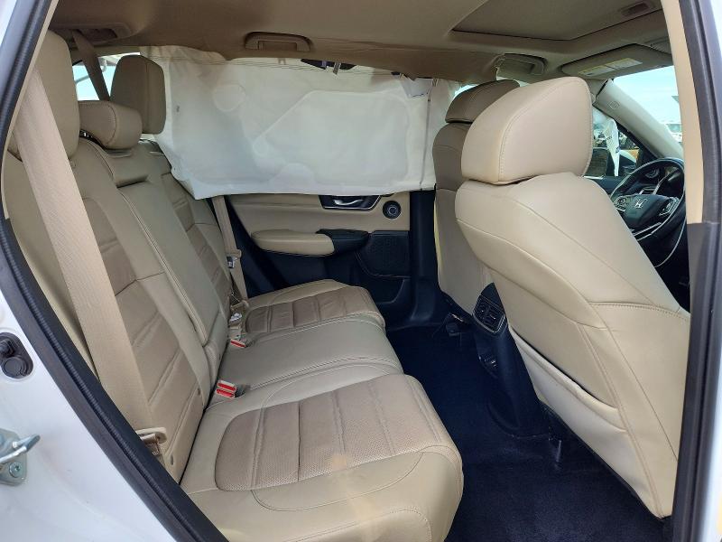 Photo 11 from auction – 2021 HONDA CR-V TOURI with VIN 7FARW1H99ME006390