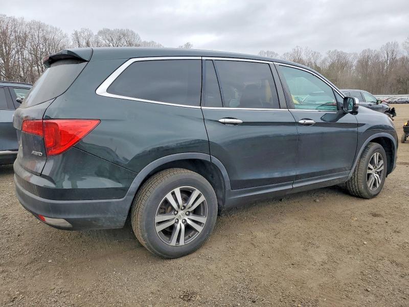 Photo 3 from auction – 2016 HONDA PILOT with VIN 5FNYF6H57GB094023