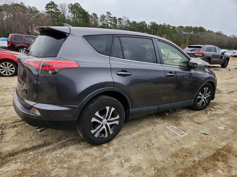 Photo 3 from auction – 2017 TOYOTA RAV4 LE with VIN JTMBFREV1HJ164069