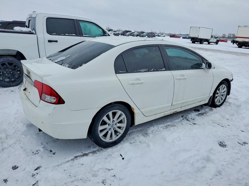 Photo 3 from auction – 2010 HONDA CIVIC EXL with VIN 2HGFA1F05AH026399