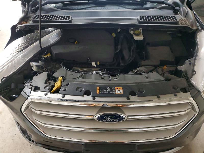 Photo 12 from auction – 2018 FORD ESCAPE with VIN 1FMCU9GD7JUC60965