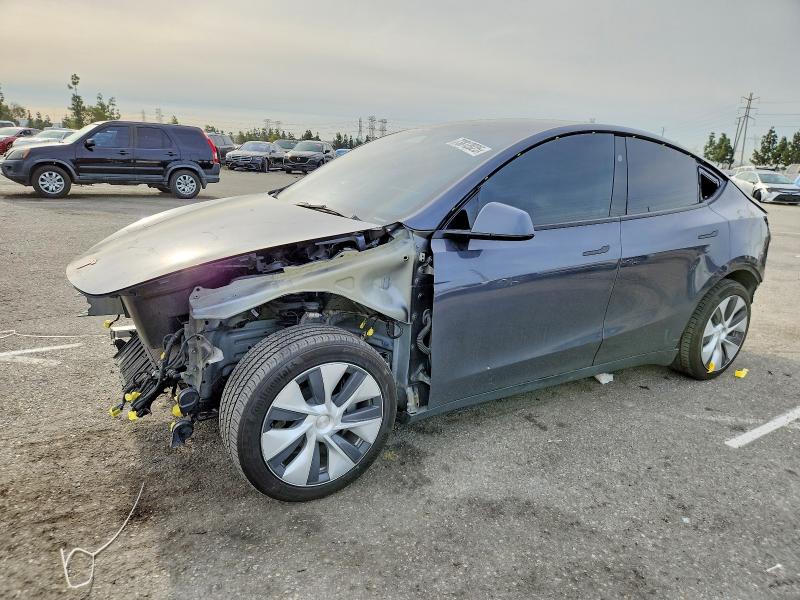 TESLA MODEL Y 2023 with VIN 7SAYGDED7PF915699 - Photo from auction