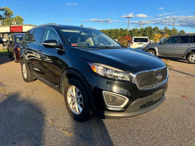 KIA SORENTO LX 2016 with VIN 5XYPGDA38GG106078 - Photo from auction