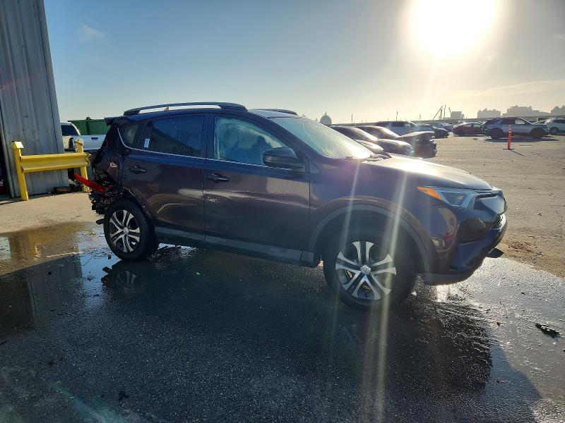 Photo 4 from auction – 2018 TOYOTA RAV4 with VIN 2T3ZFREV2JW509535