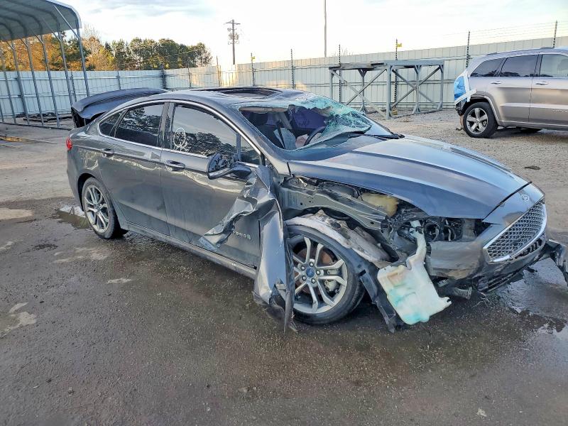 Photo 4 from auction – 2019 FORD FUSION TIT with VIN 3FA6P0RU0KR144832