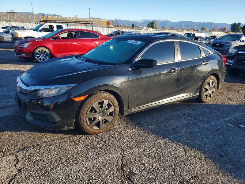 HONDA CIVIC LX 2016 z numerem VIN 19XFC2F56GE223838 - Zdjęcie z aukcji